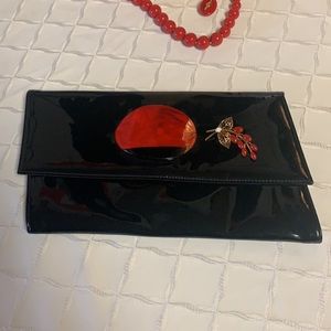 Vintage    varnished  handbag/ clutch golden chaine strap with red& black buckle